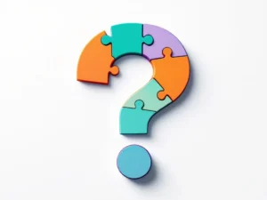 Kleurrijke puzzelstukjes in vraagtekenpatroon met game controller, sommige verbonden, andere losstaand op witte achtergrond